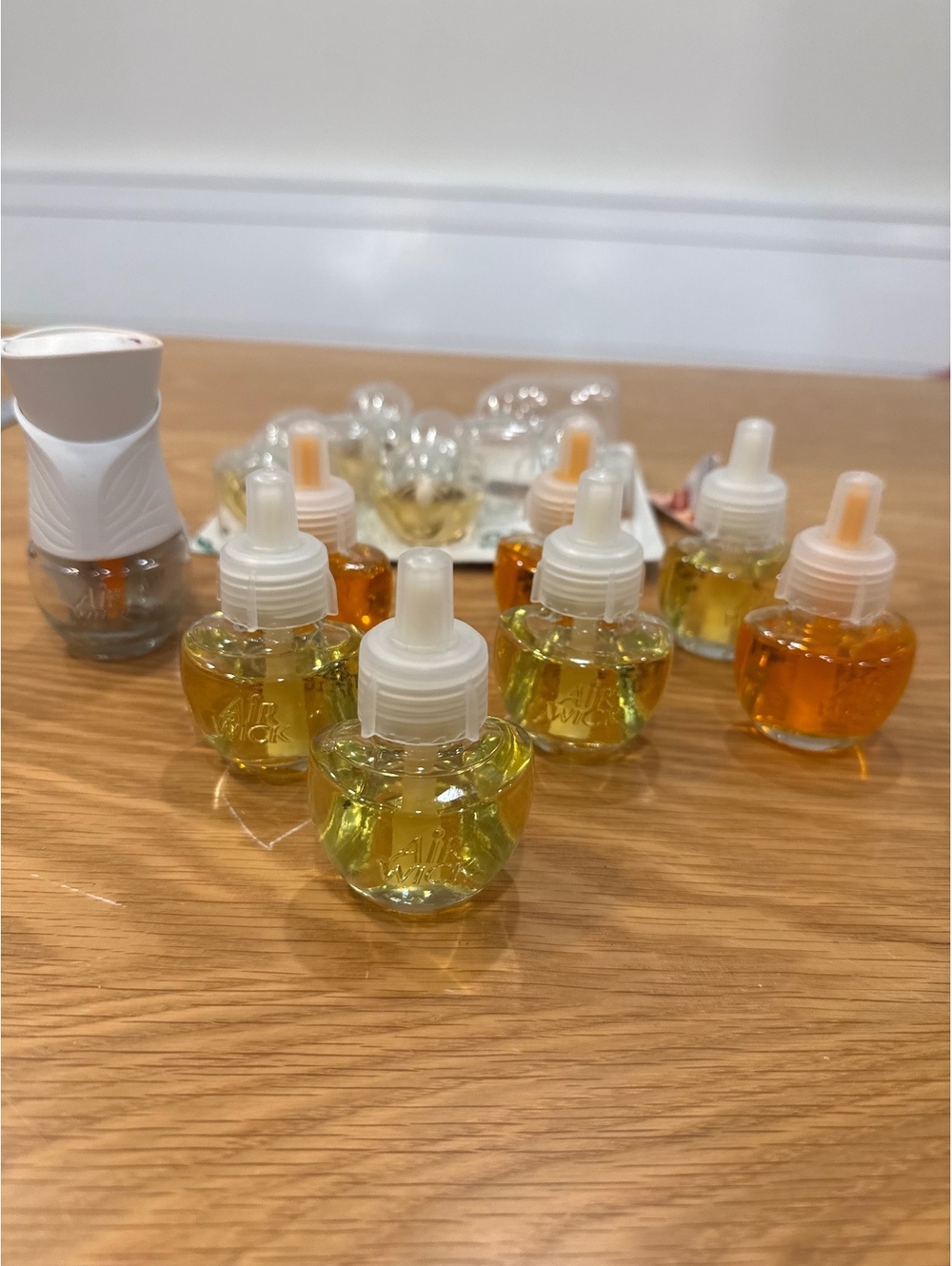 Air Wick Essential Oils Plug-In Scented Oil Warmer with Multiple Refills